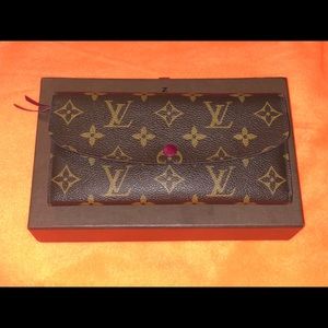 SOLD****Authentic Louis Vuitton Emilie wallet